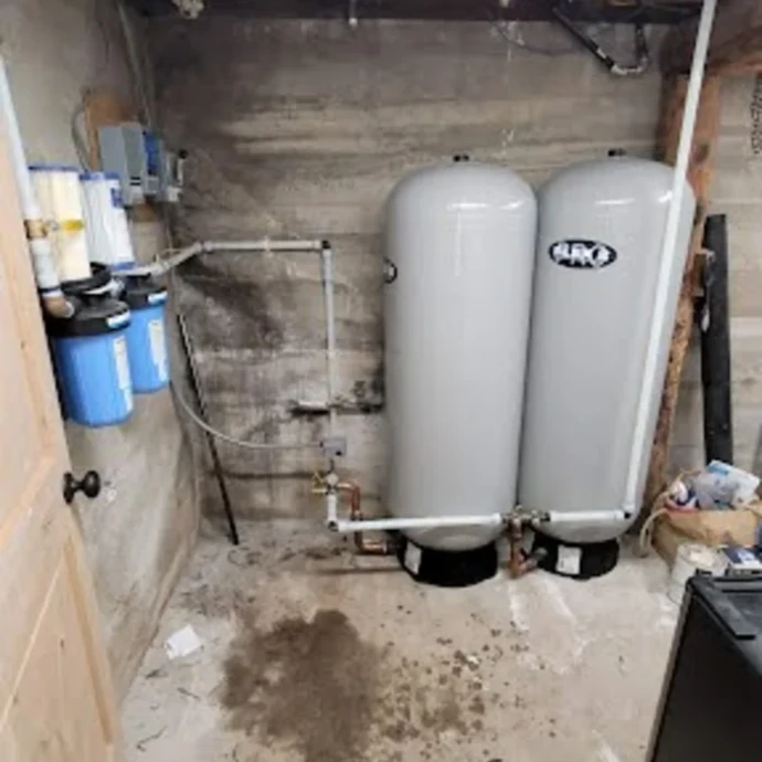 room with well water tanks